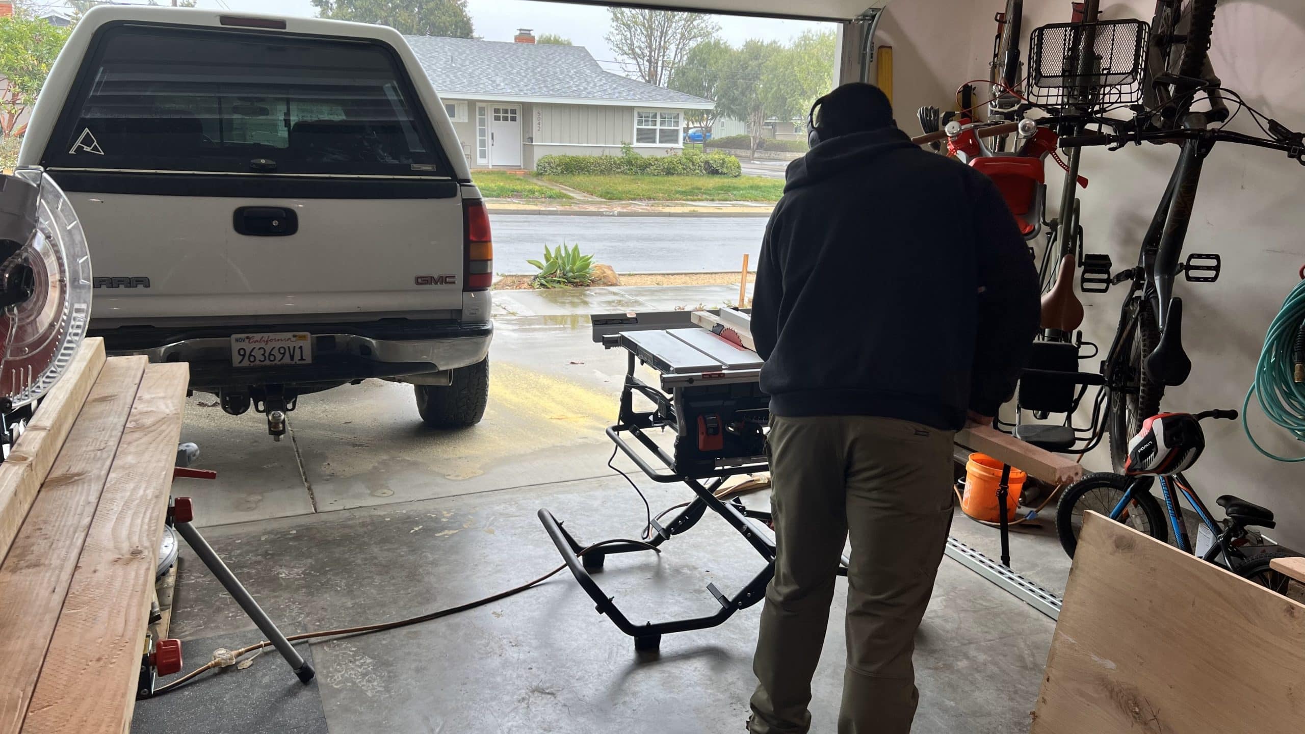 me on table saw in garage rain scaled